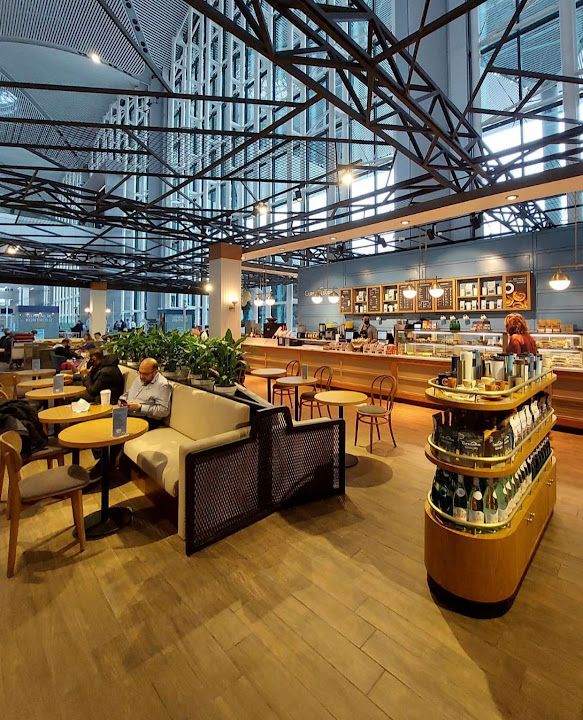 Cups & Clouds Coffee IGA Arrivals Floor
