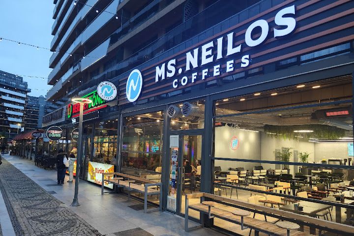 Ms. Neilos Coffees Lens AVM